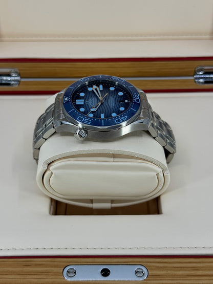 Omega Seamaster Diver 300M, 42mm, Stainless Steel, Summer Blue, Ref# 210.30.42.20.03.003, dated 2026