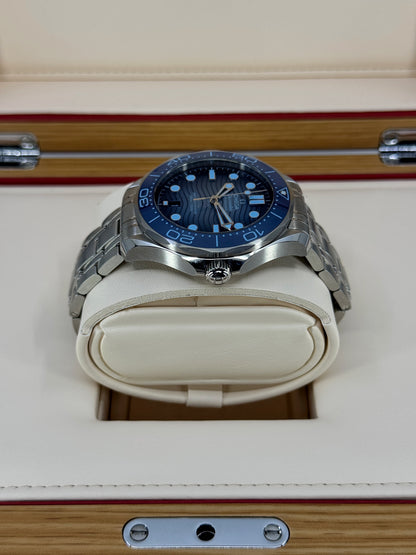 Omega Seamaster Diver 300M, 42mm, Stainless Steel, Summer Blue, Ref# 210.30.42.20.03.003, dated 2026