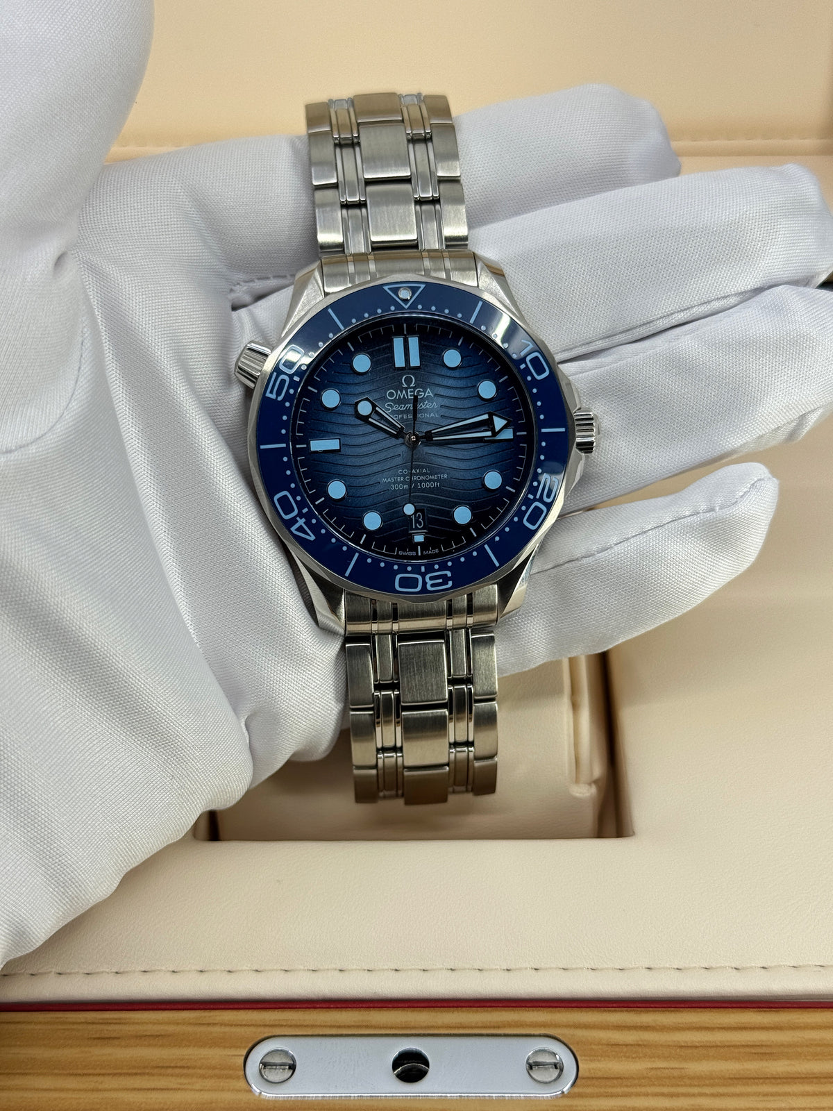 Omega Seamaster Diver 300M, 42mm, Stainless Steel, Summer Blue, Ref# 210.30.42.20.03.003, dated 2026