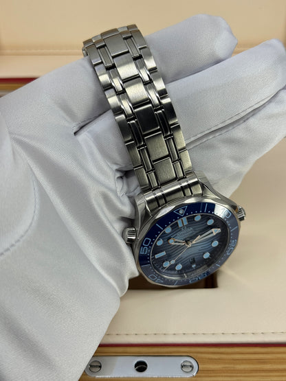 Omega Seamaster Diver 300M, 42mm, Stainless Steel, Summer Blue, Ref# 210.30.42.20.03.003, dated 2026