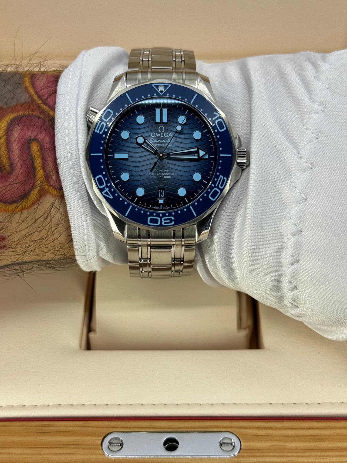 Omega Seamaster Diver 300M, 42mm, Stainless Steel, Summer Blue, Ref# 210.30.42.20.03.003, dated 2026