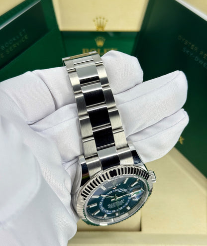 Rolex Sky-Dweller 42mm, 18k WG & Stainless Steel, Blue, Oyster, Ref# 336934-0005, dated 2025