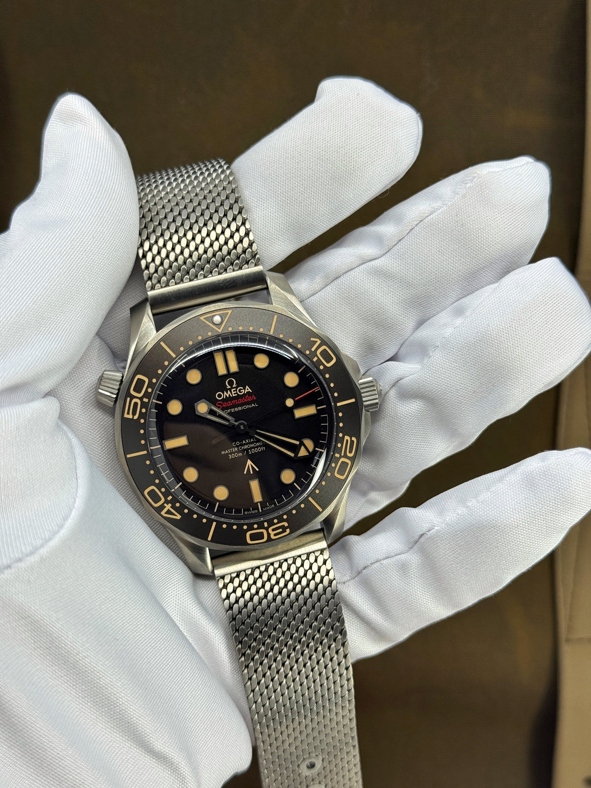 Omega Seamaster Diver 300M, James Bond 007, No Time To Die Edition, 42mm, Titanium, Brown, Ref# 210.90.42.20.01.001, dated 2026