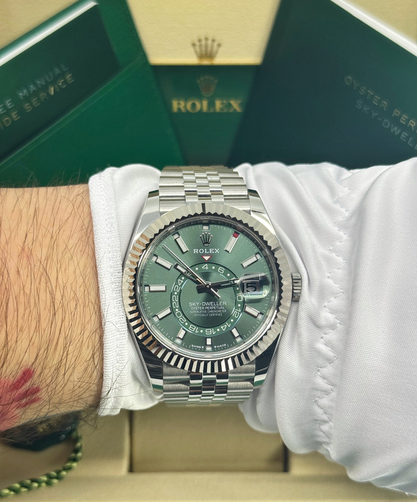 Rolex Sky-Dweller 42mm, 18k WG & Stainless Steel, Green, Jubilee, Ref# 336934-0002, dated 2026