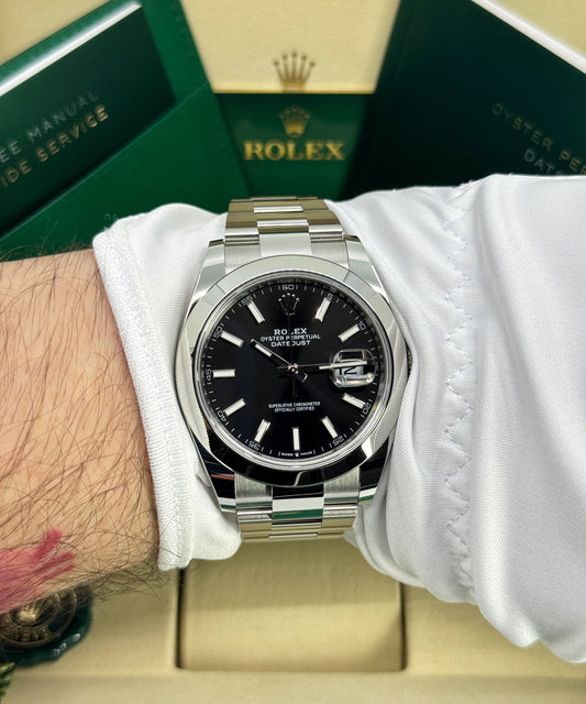 Rolex Datejust with a black dial on an Oyster bracelet