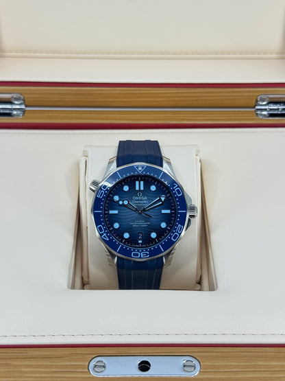 Omega Seamaster Professional Diver 300M, 42mm, Stainless Steel, Summer Blue, Ref# 210.32.42.20.03.002, dated 2026